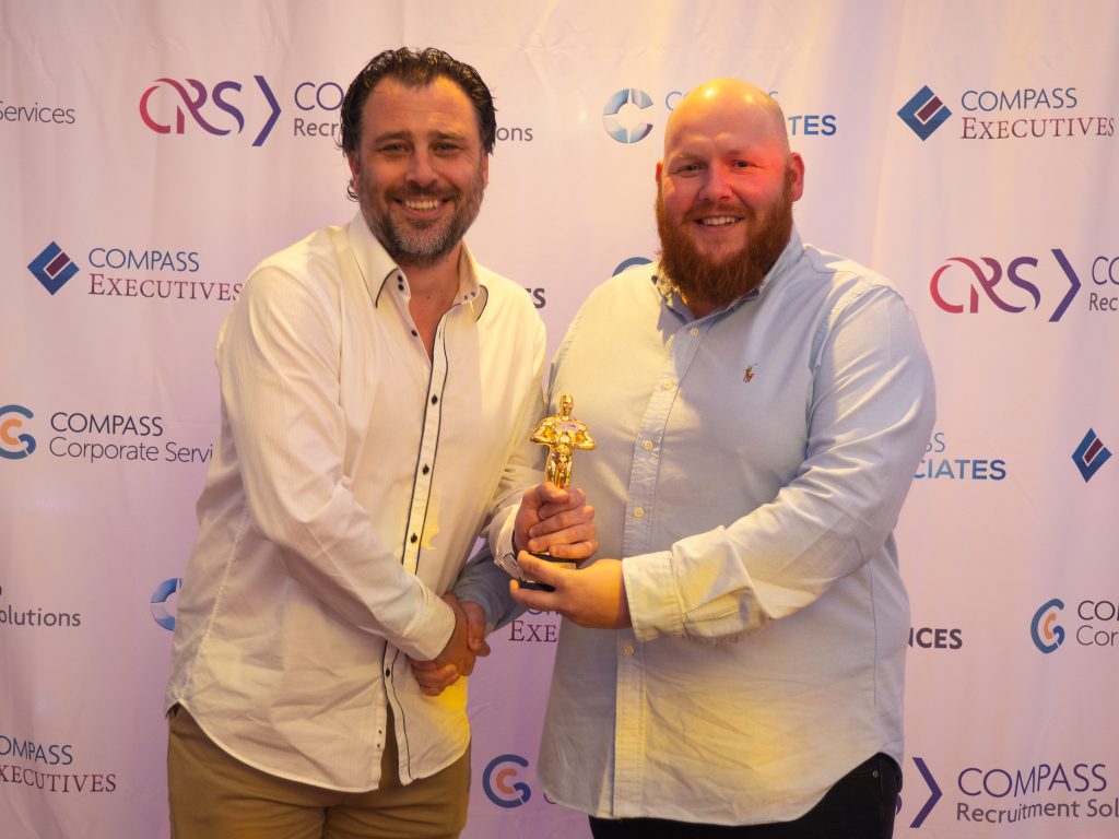 Compass Associates - Compass Core Values Awards 2022 - Christian Hhannam being presented his award win by Director Carl Dutton